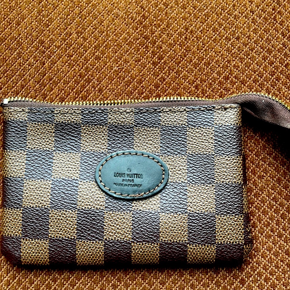 Brown checkered coin pouch